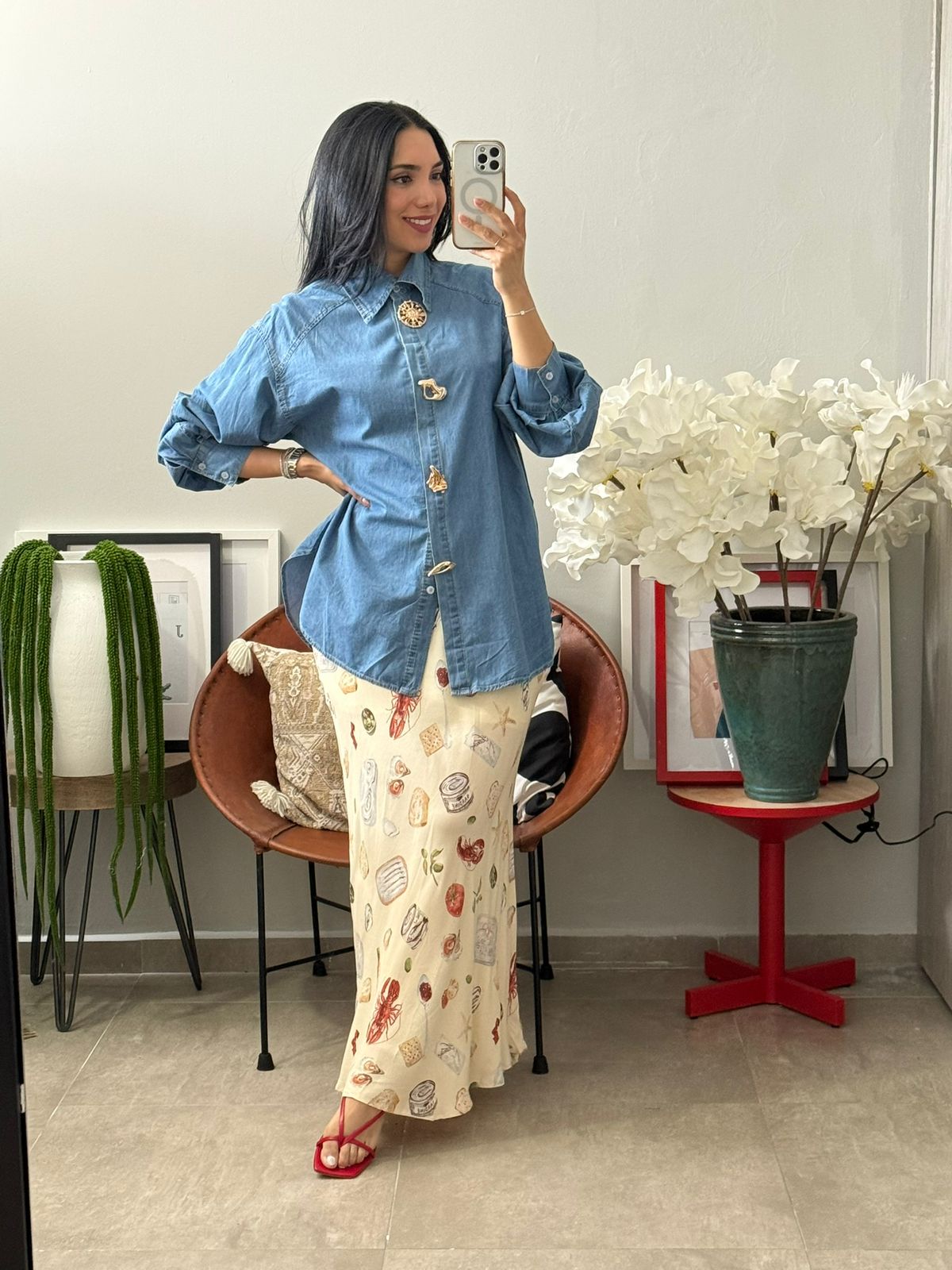 Camisa de mezclilla con botones dorados